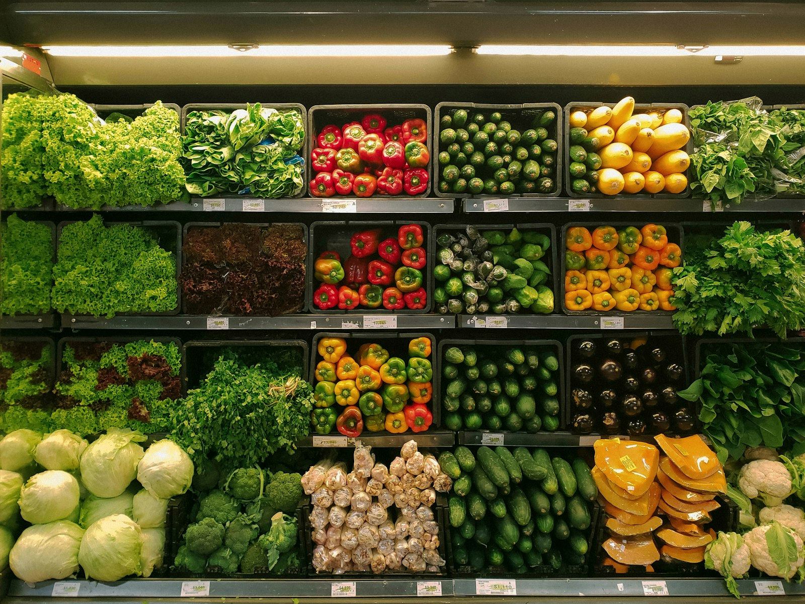 A grocer’s produce display of vegetables and fruit